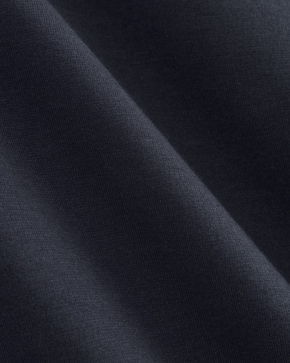 The Dream Mini Skirt in Navy — detail view