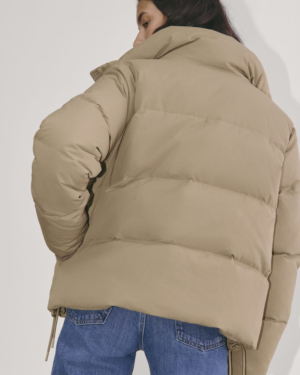 The Puffer Bomber in Taupe Grey — detail view