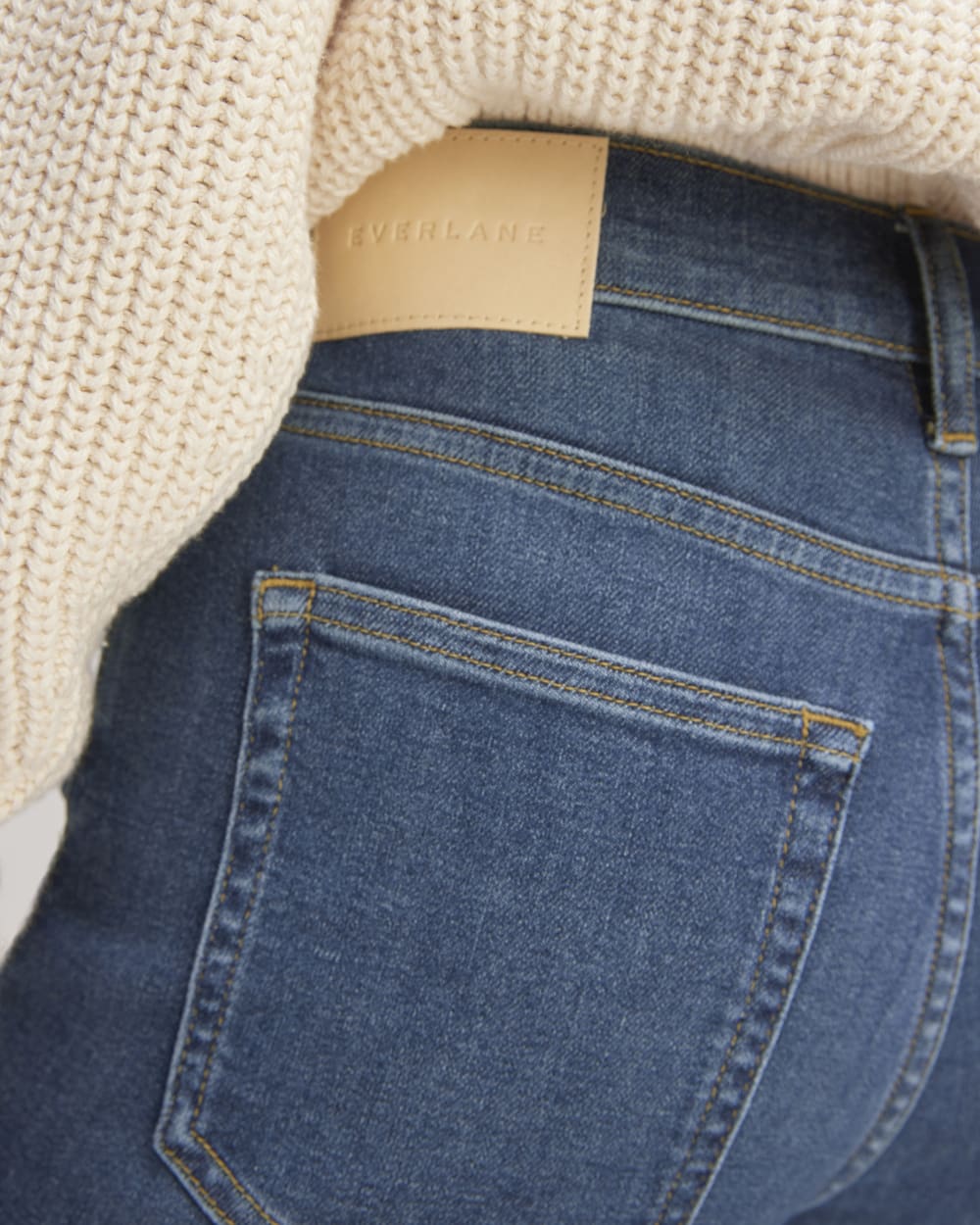 The Kick Bootcut Jean in Dark Indigo Blue — detail view