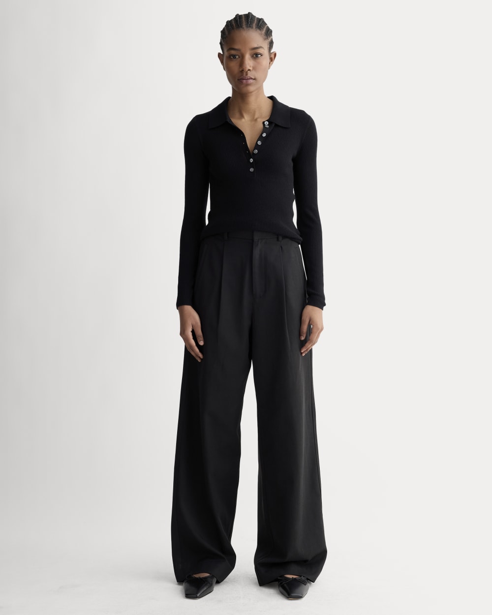 The Polo in Ultrasoft Merino in Black — detail view