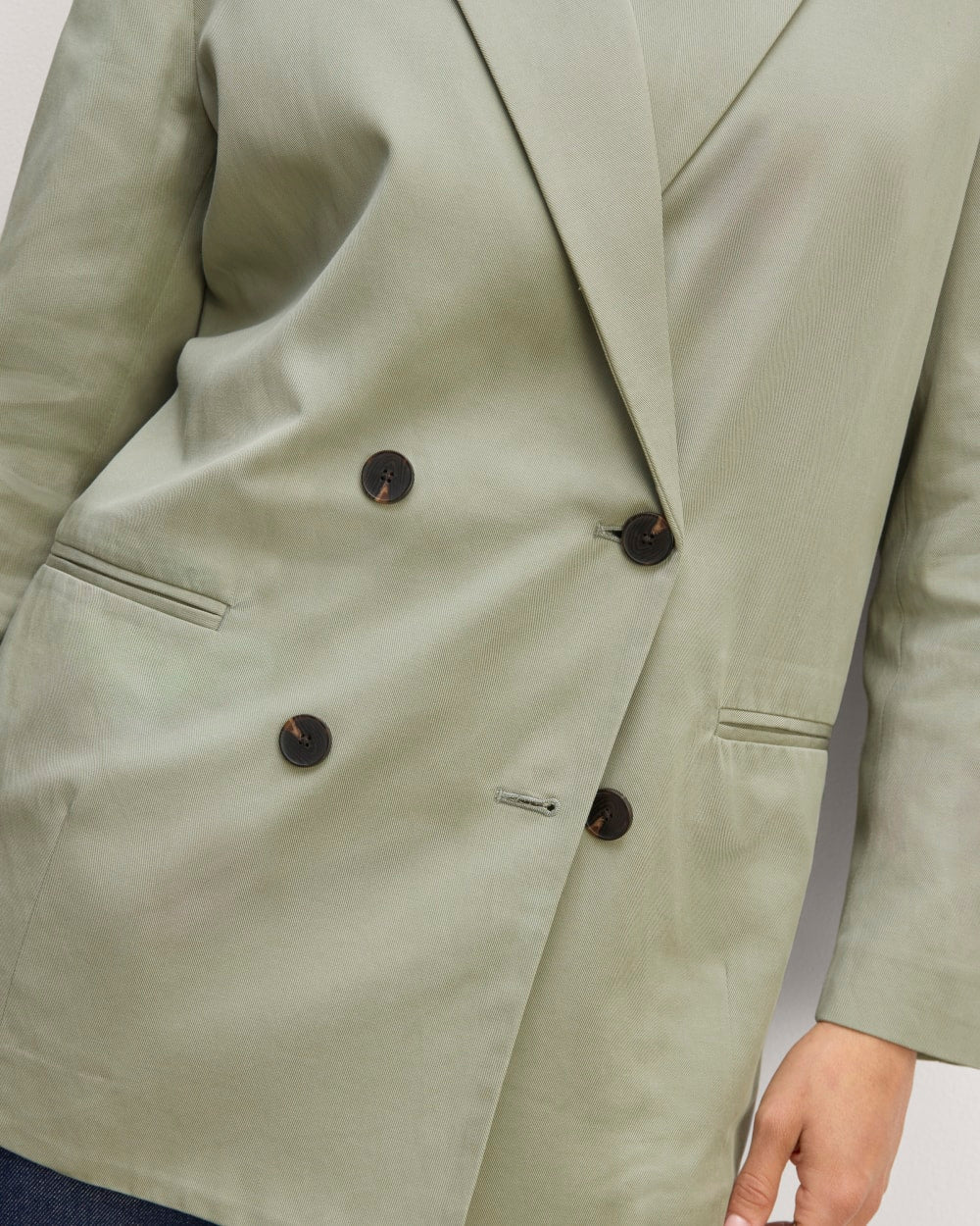 The Double-Breasted Blazer in Buttersmooth in Seagrass — detail view