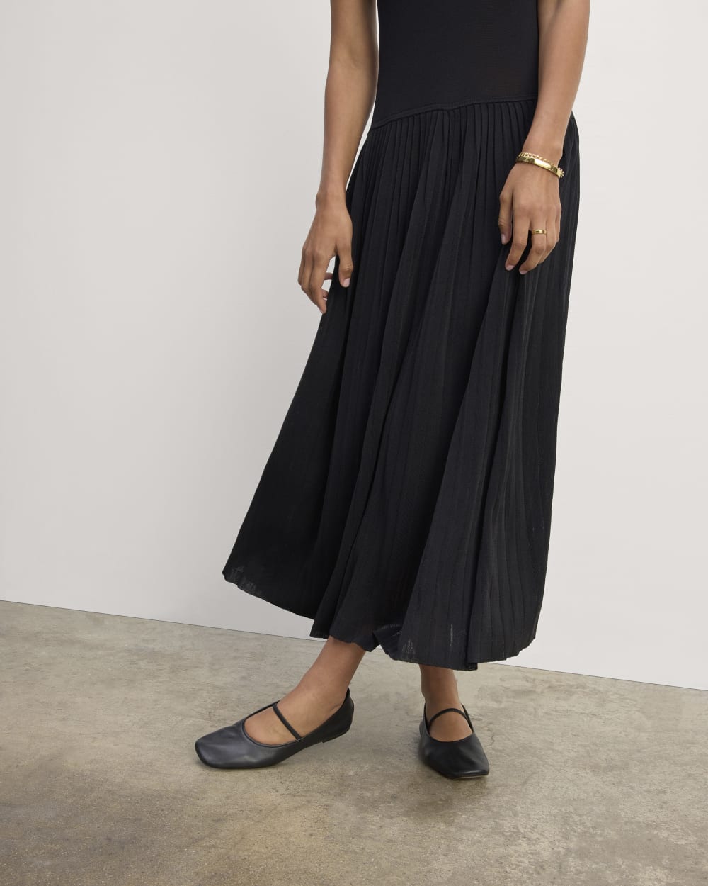 The Knit Pleated Dress in Black — detail view