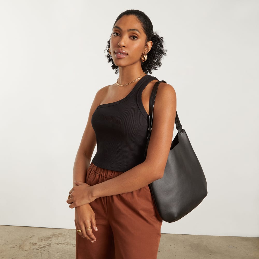 The Ribbed One-Shoulder Tank in Black — detail view