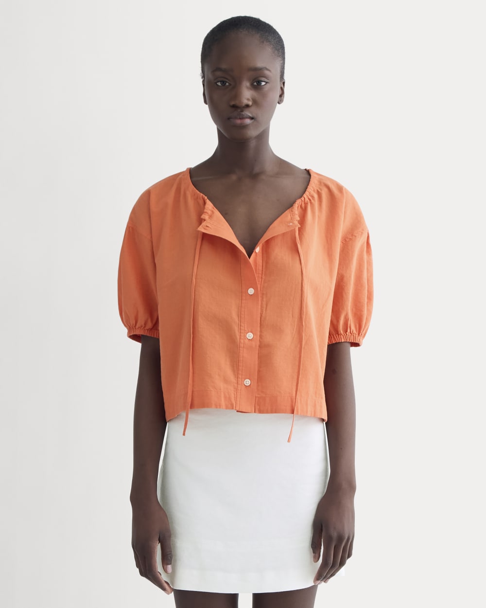 The Gauze Button-Up in Soft Orange — front view
