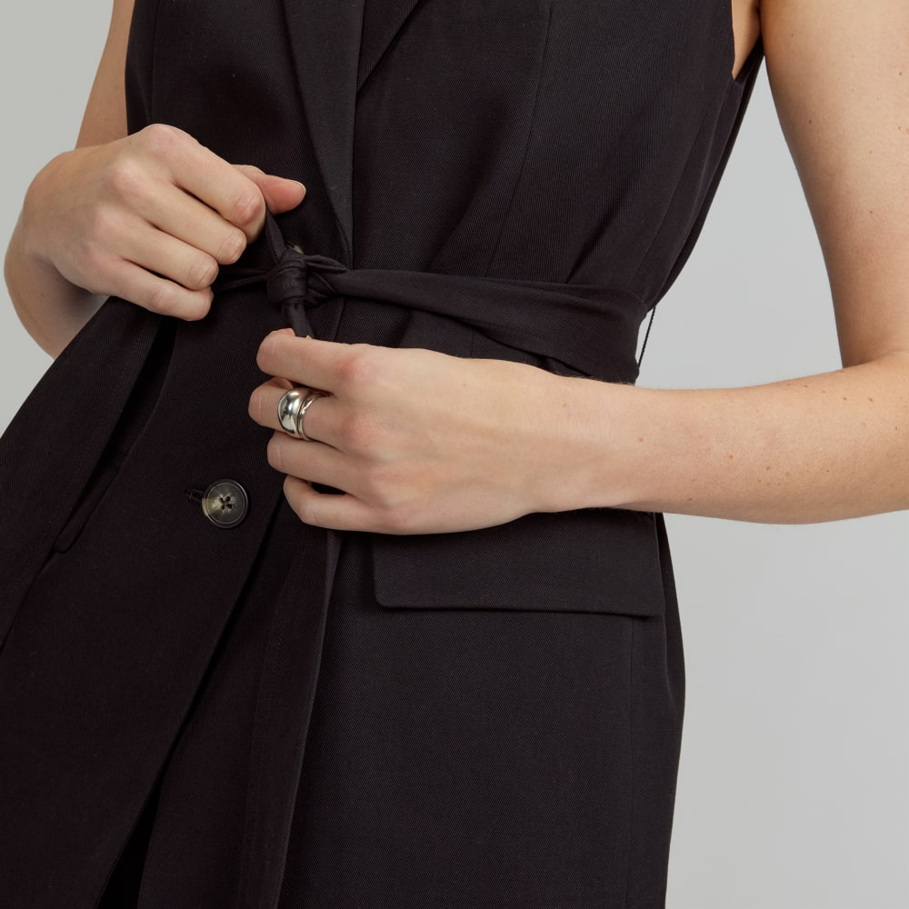 The Sleeveless Blazer in Buttersmooth in Black — detail view
