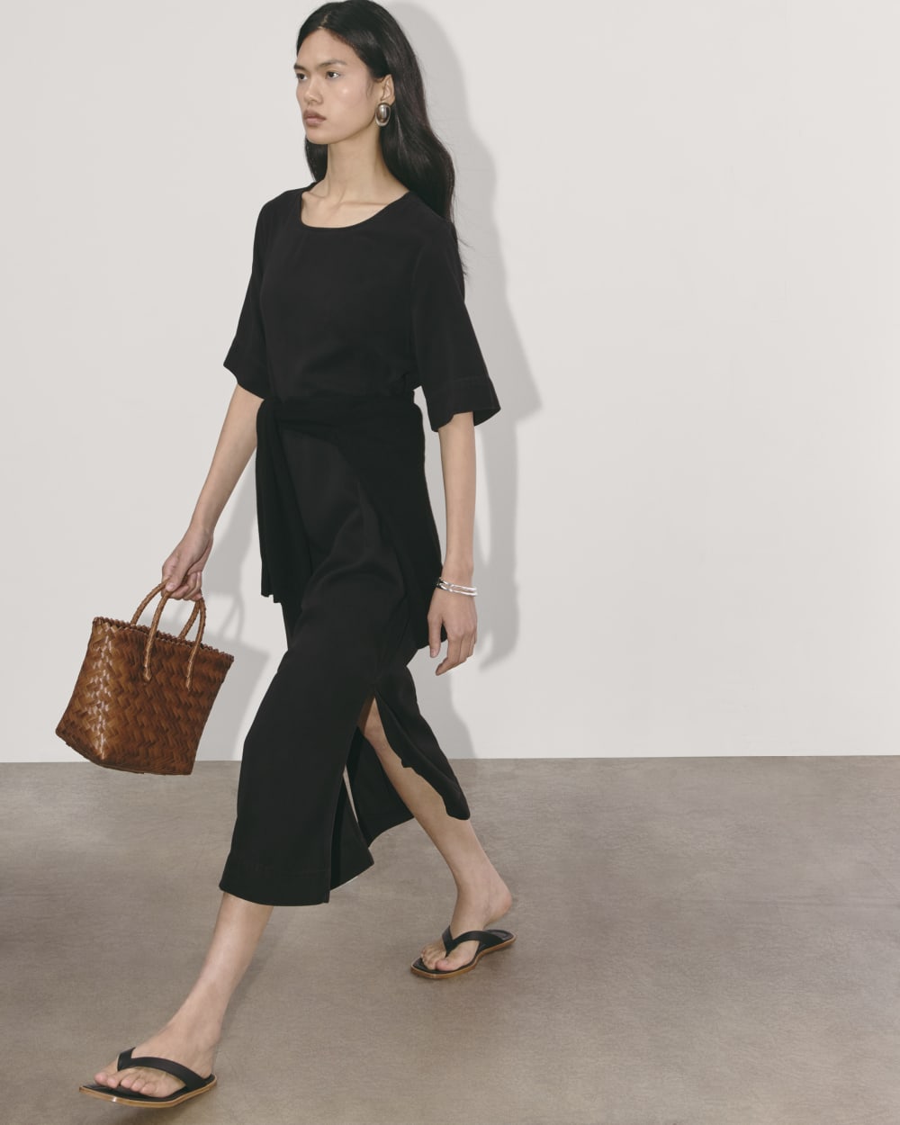 The Relaxed T-Shirt Dress in Buttersoft in Black — detail view