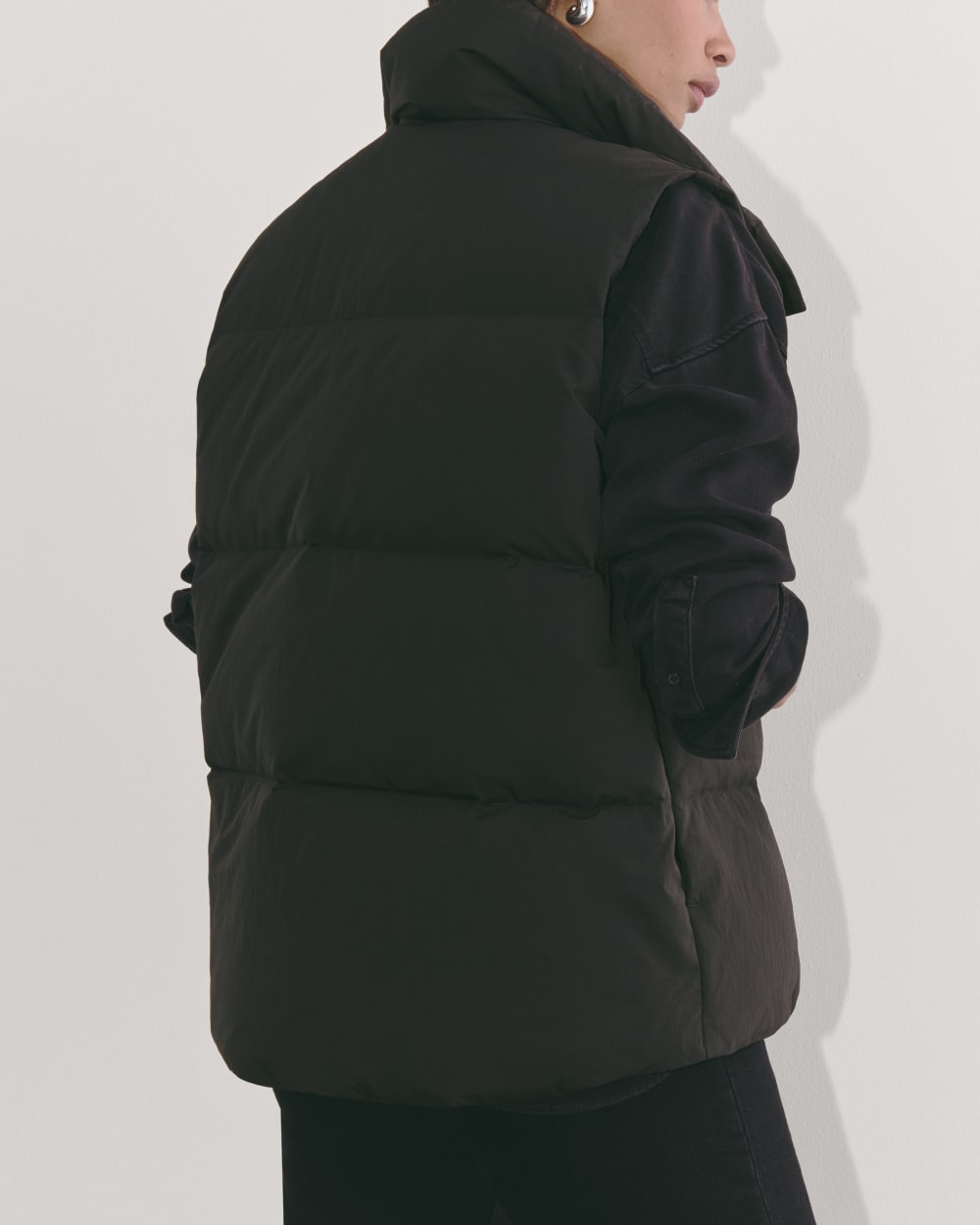 The Puffer Vest in Black — detail view