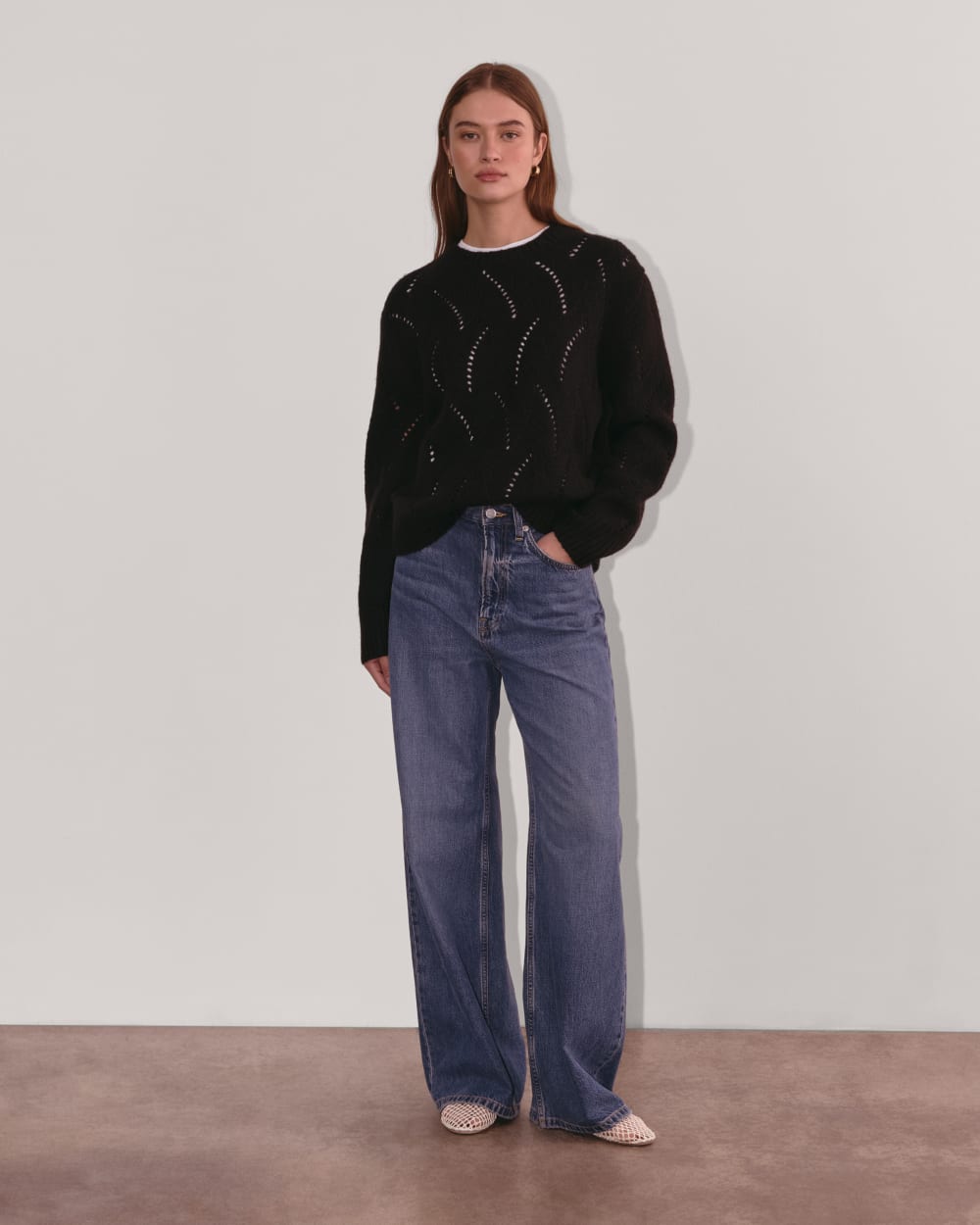 The Pointelle Sweater in Cloud in Black — detail view