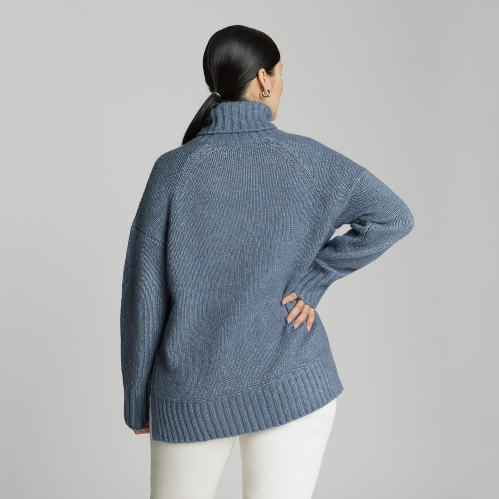 The Cloud Turtleneck in Faded Blue — detail view