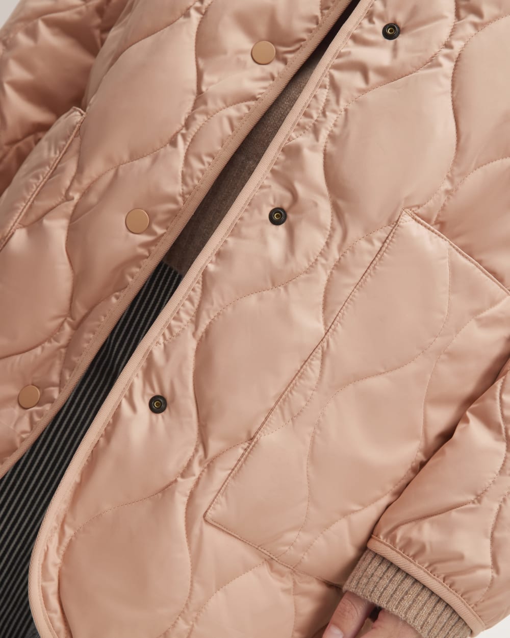 The Quilted Liner in Blush Pink — detail view