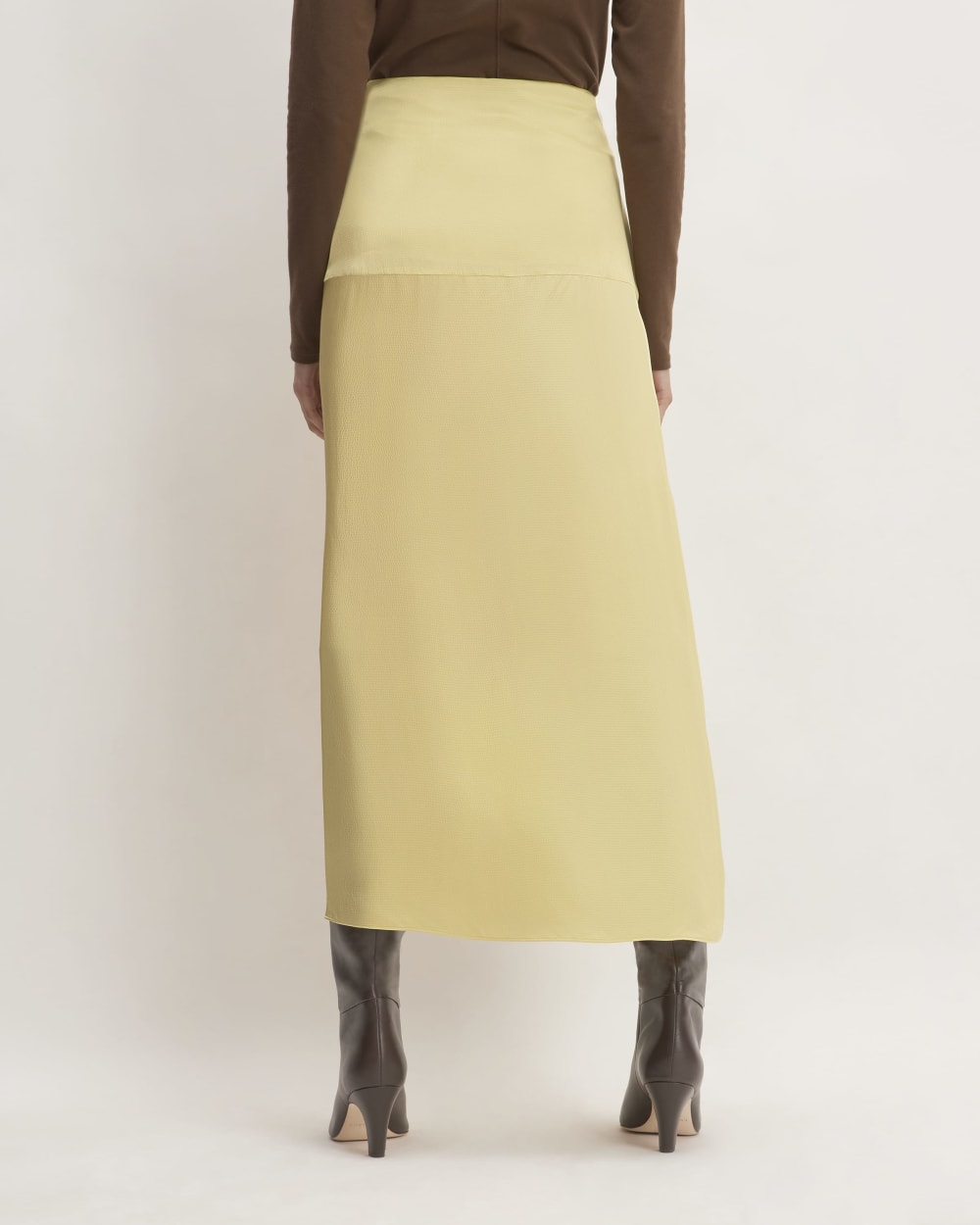 The Hammered Satin Slip Skirt in Raffia — detail view