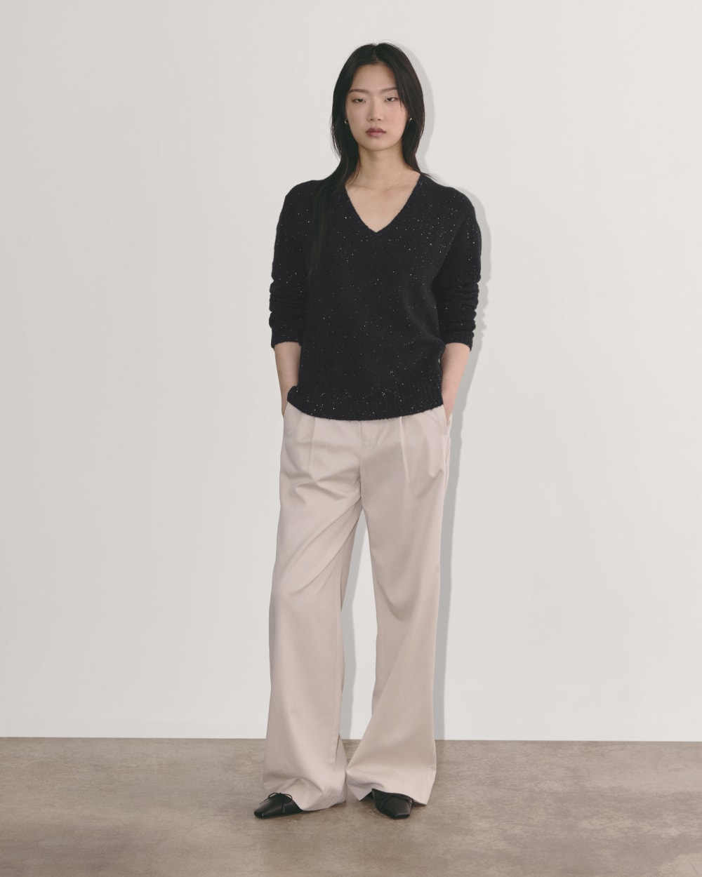 The V-Neck Sweater in Plush Cotton in Black Confetti — detail view
