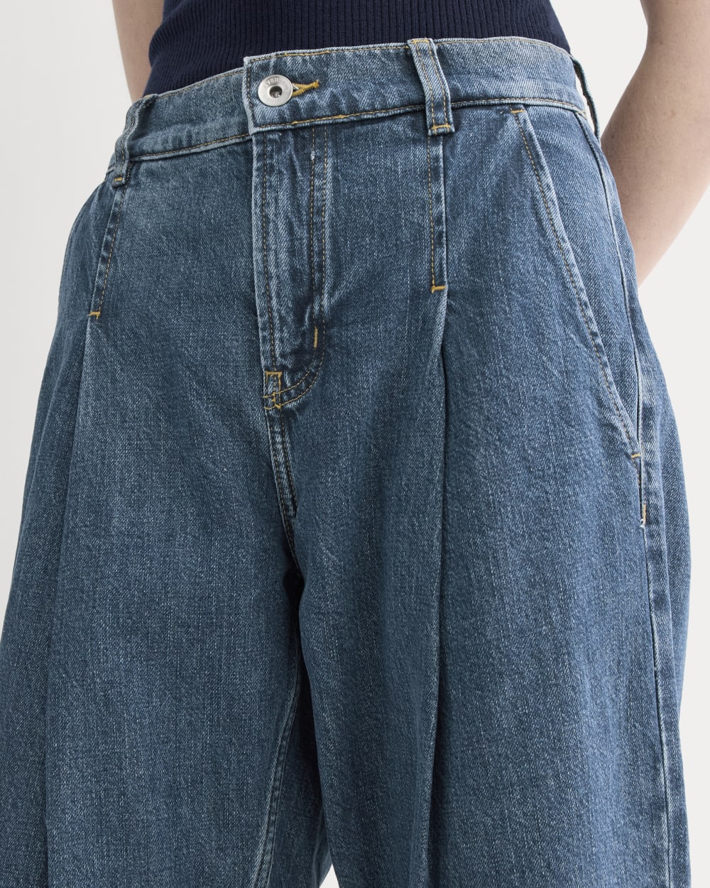 The High Rise Pleated Jean in Mid Indigo — detail view