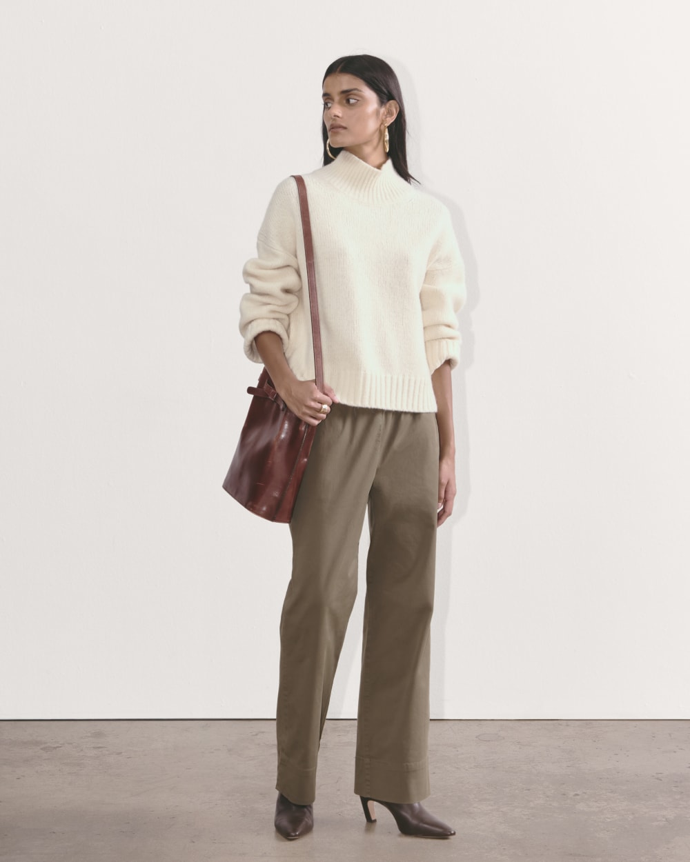 The Cloud Oversized Turtleneck in Bone — detail view