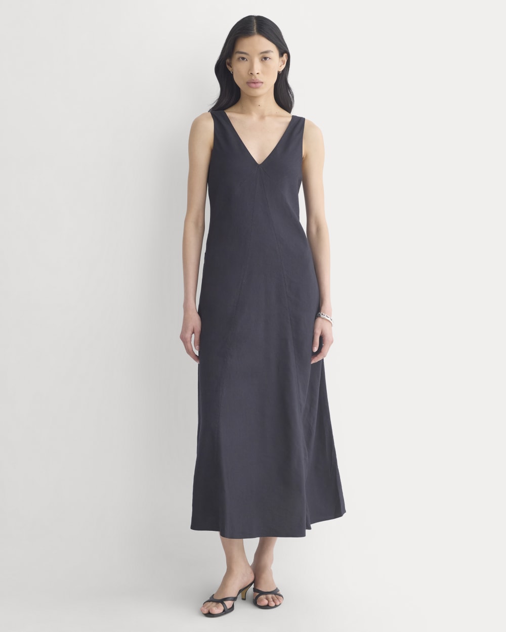 Deep V Seamed Dress in Stretch Linen in Black — front view