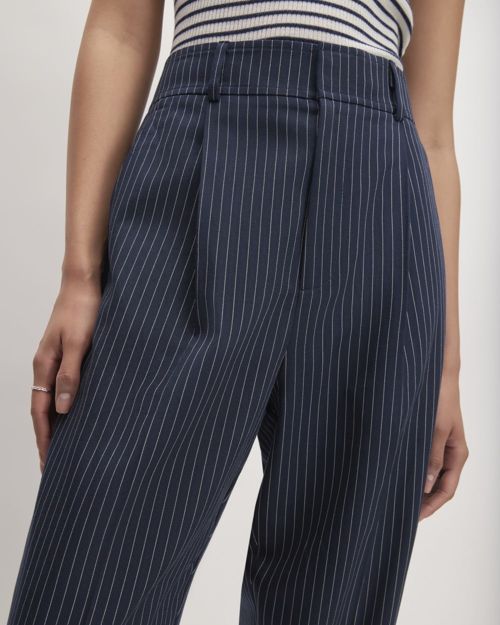 The Draper Tapered Pant in Buttersmooth in Navy / Bone — detail view