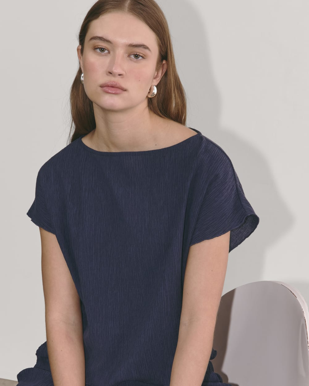 The Crinkle Top in Navy — detail view