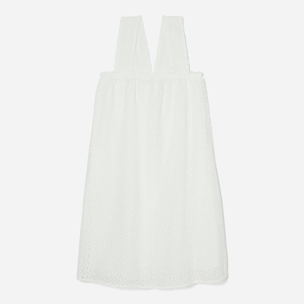 The Eyelet Smock Dress in White — front view