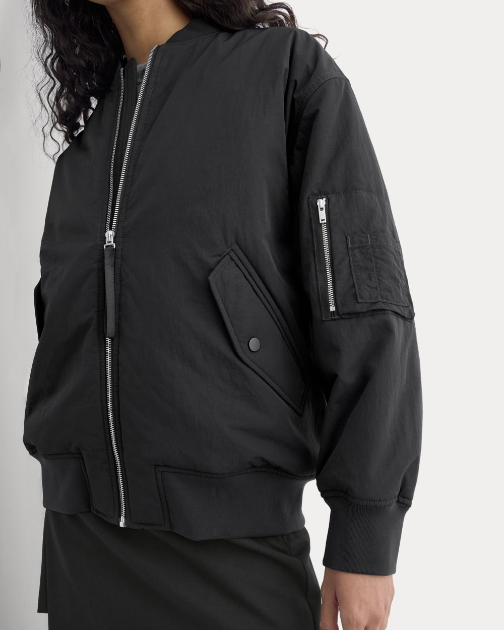 Renew Oversized Puffer Bomber in Black — detail view