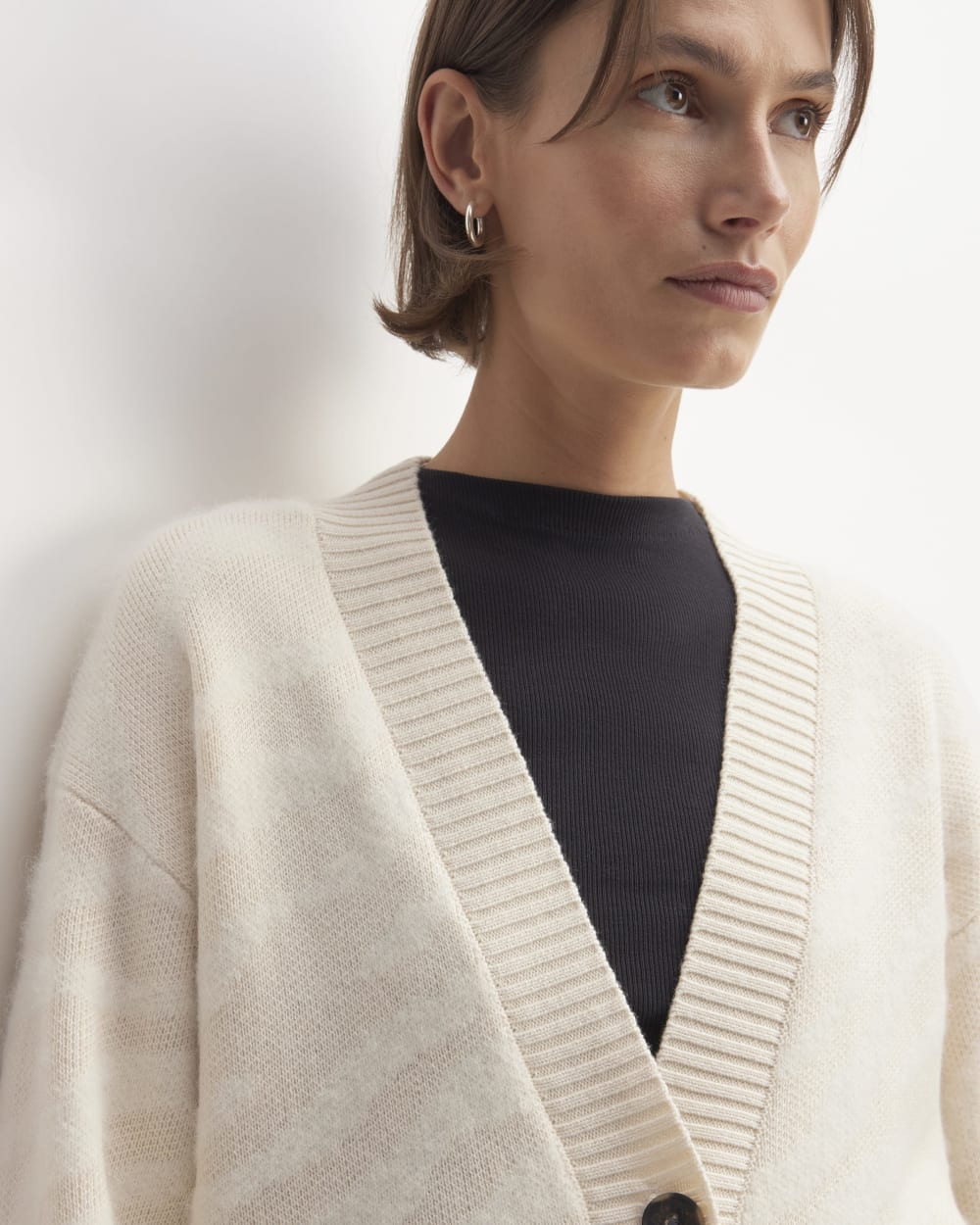 The Alpaca Tiger Jacquard Cardigan in Canvas / Snow — detail view