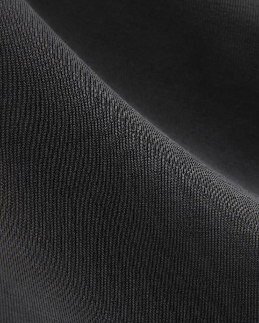 The Draped Top in Butterknit in Black — detail view