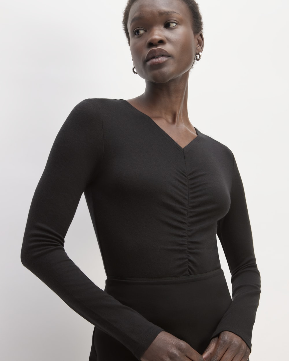 The Ruched V-Neck Tee in Butterluxe in Black — detail view