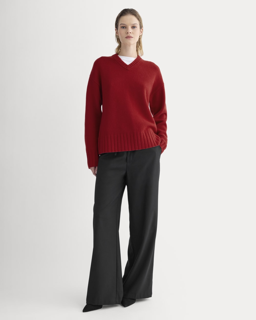 V-Neck Sweater in Extrafine Luxe Merino in Berry Red — detail view