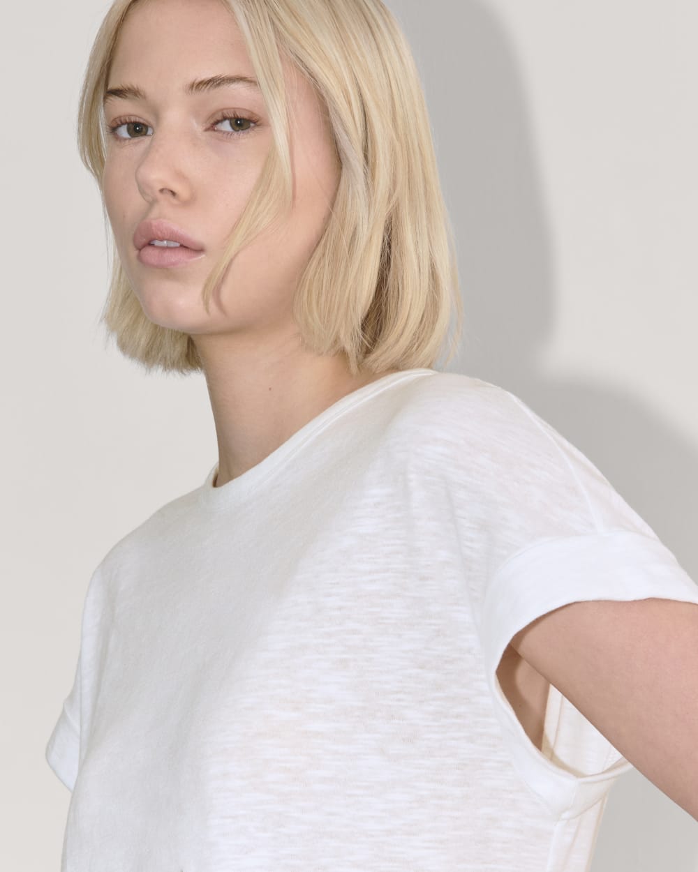 The Perform Tee in White — detail view