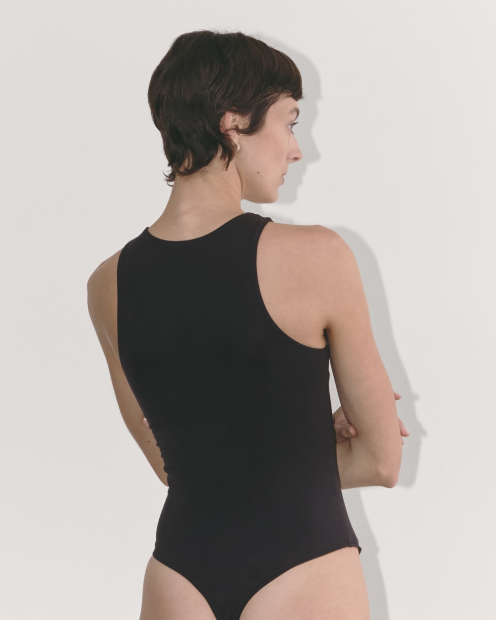 The Cutaway Tank Bodysuit in Black — detail view