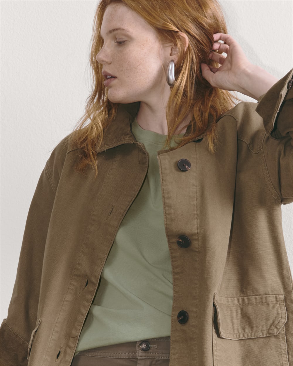 The Box-Cut Tee in Essential Cotton in Sage Green — detail view