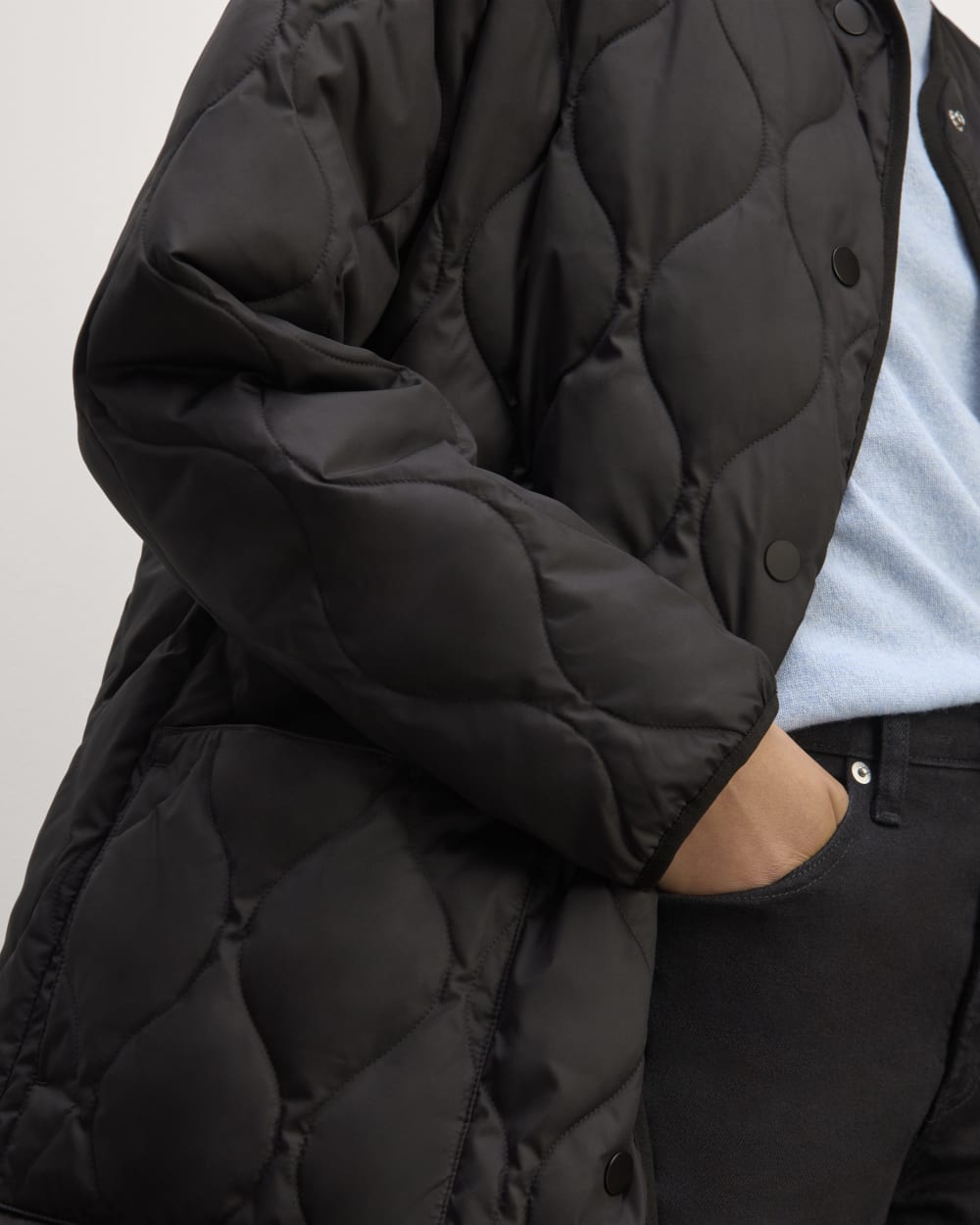 The Long Quilted Liner in Black — detail view
