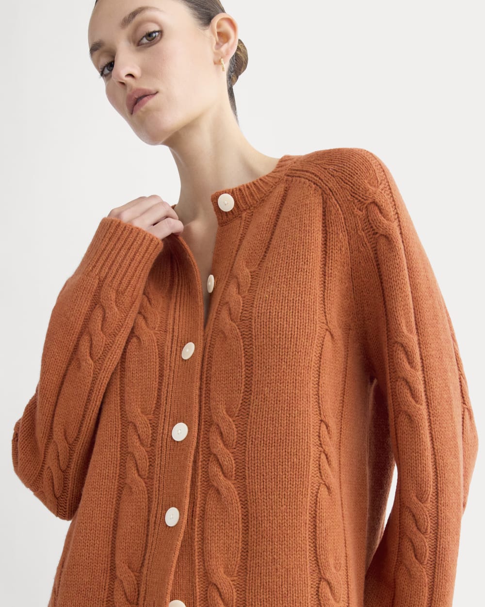 Cable Cardigan in Extrafine Luxe Merino in Rust Heather — detail view
