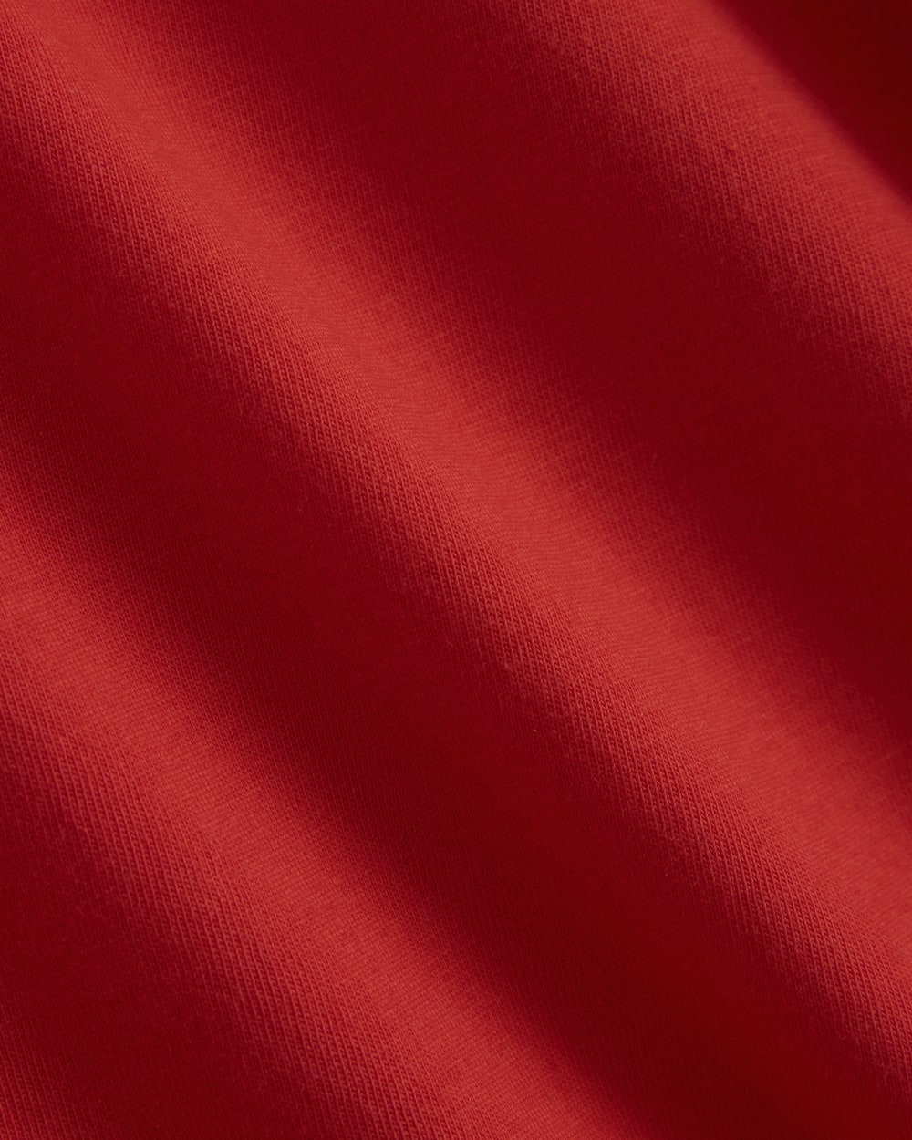 The Slim V-Neck Tee in Essential Cotton in Fiery Red — detail view