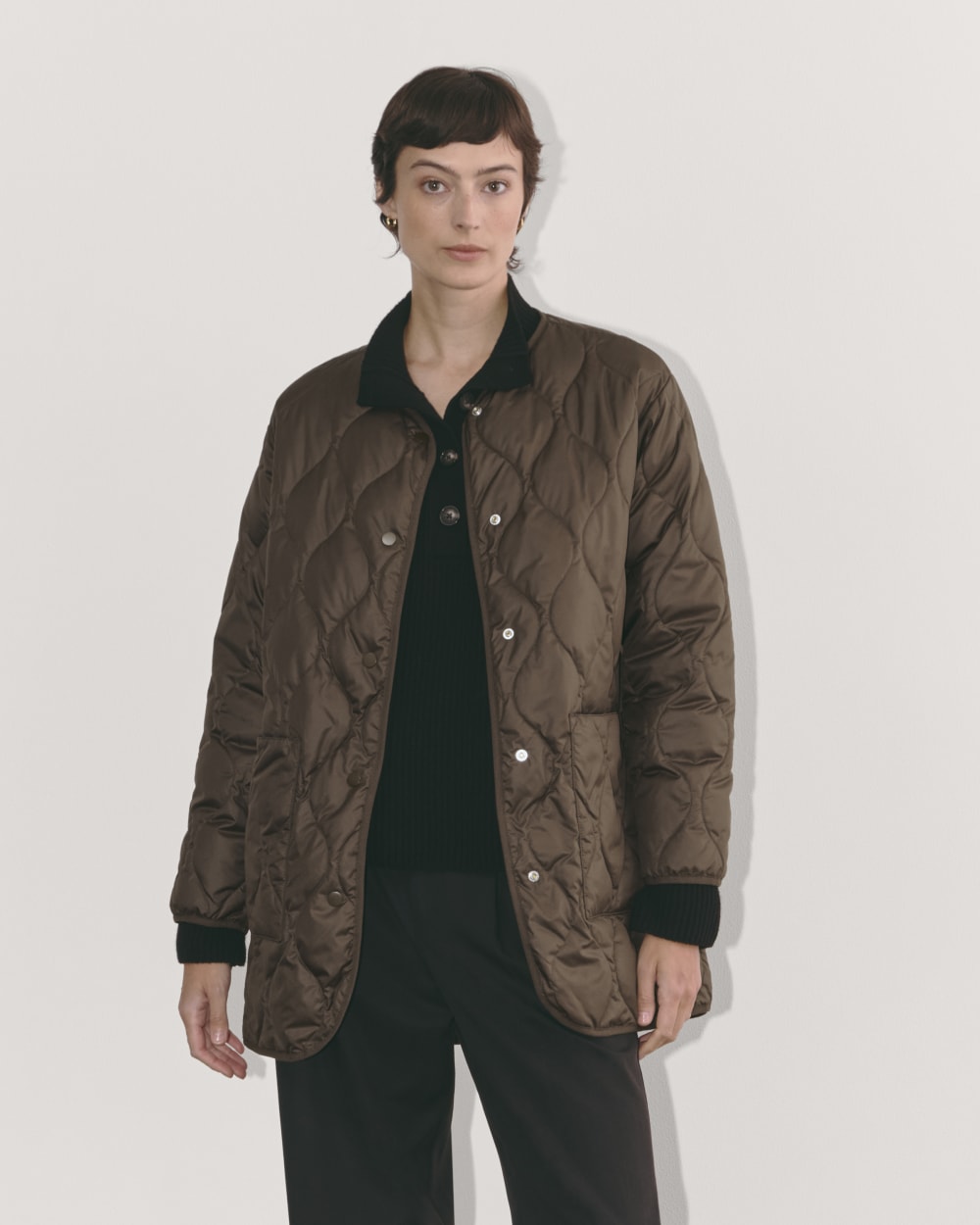 The Quilted Liner in Earth Brown — front view