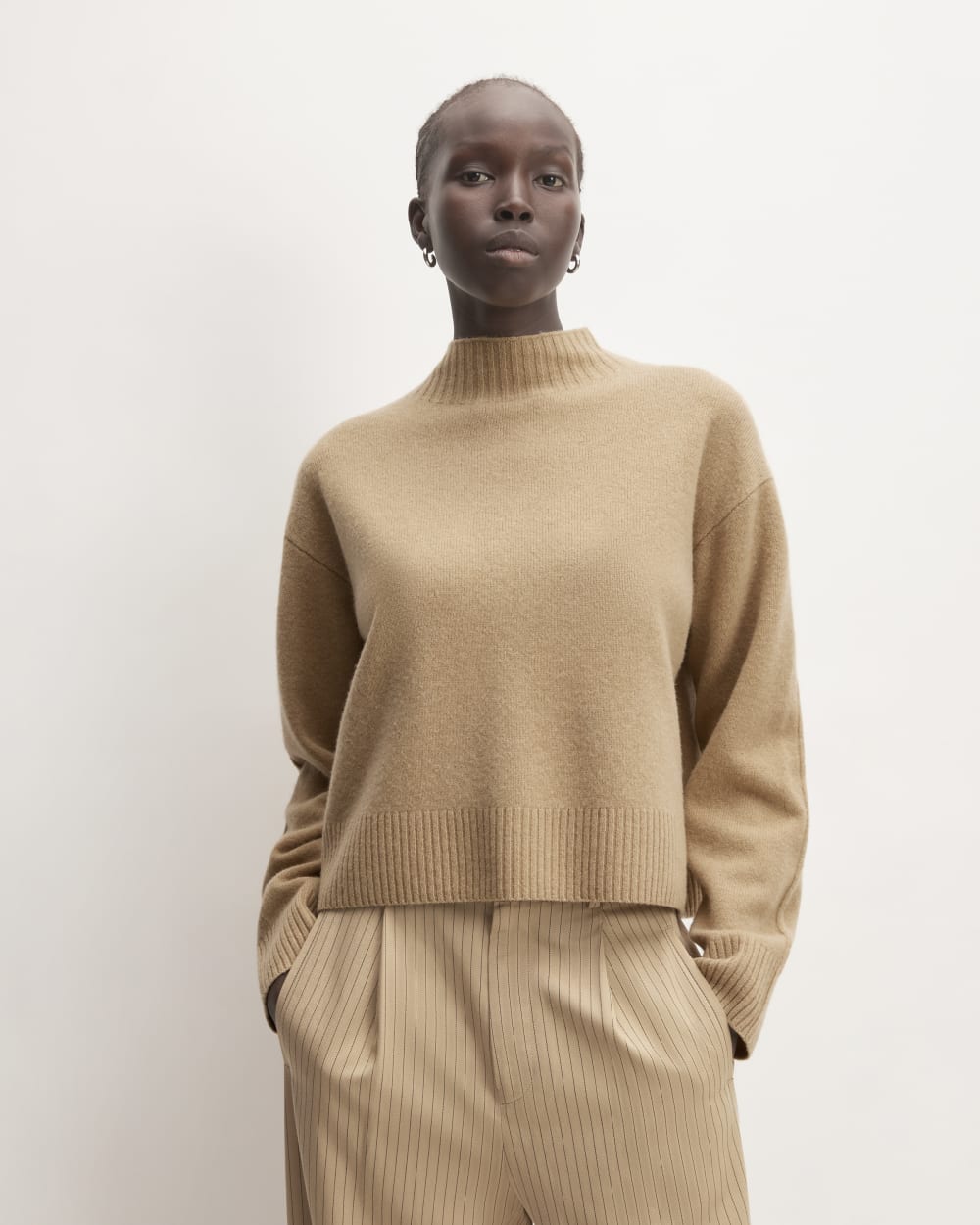 The Good Merino Wool Mockneck Sweater in Light Camel — front view
