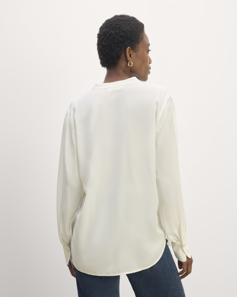 The Henley Shirt in Washable Silk in Off-White — detail view