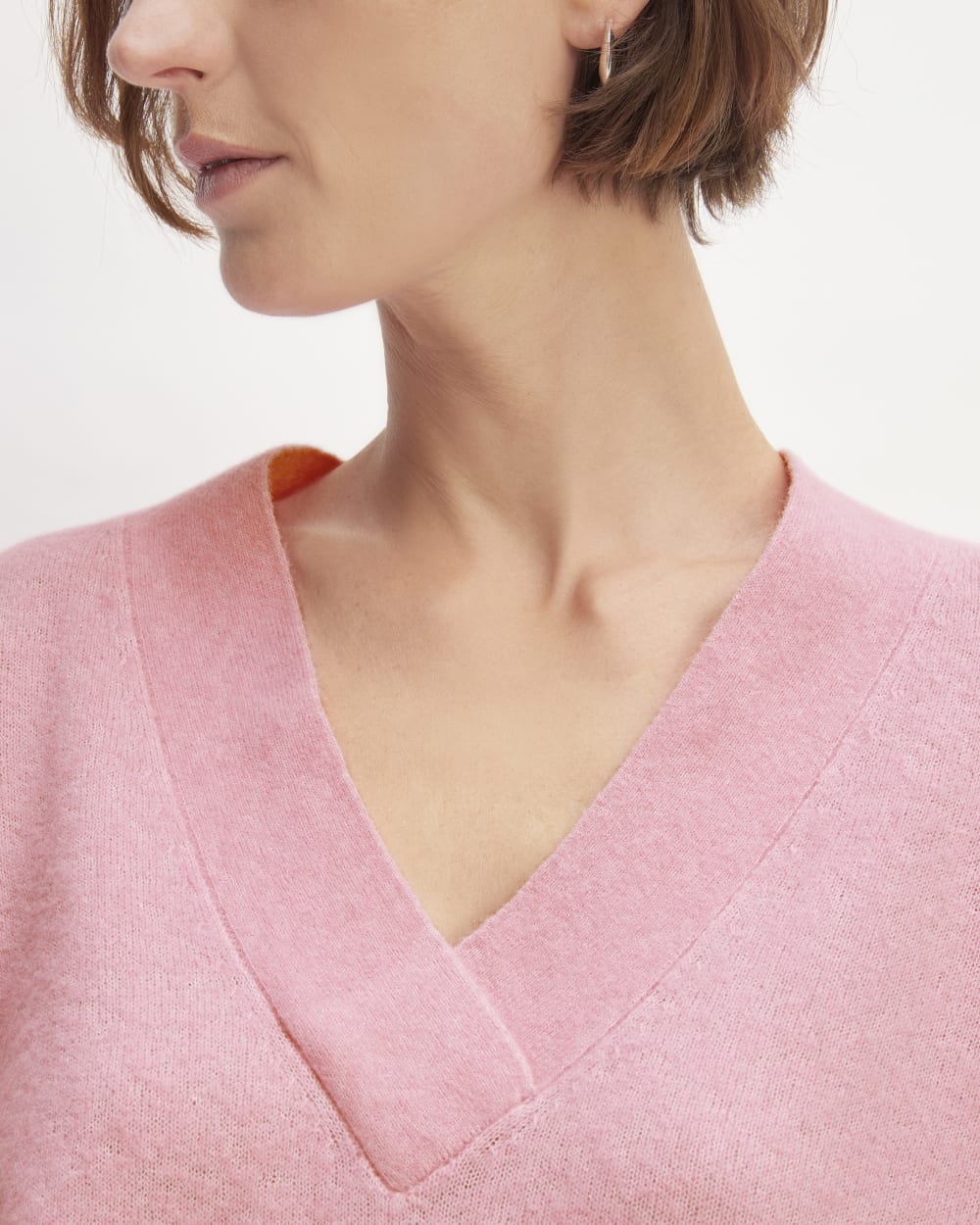 The Cozy-Stretch V-Neck Sweater in Pink Peony — detail view