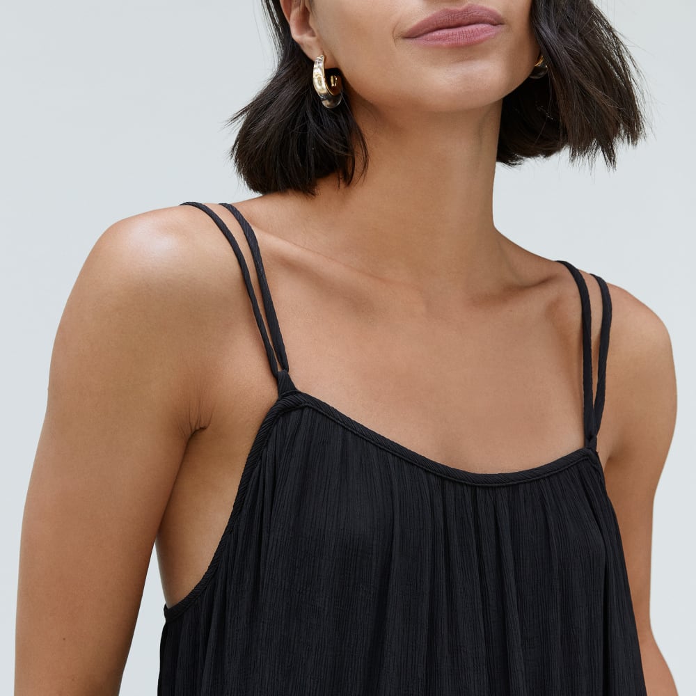 The Naia™ Ripple Tiered Maxi Dress in Black — detail view