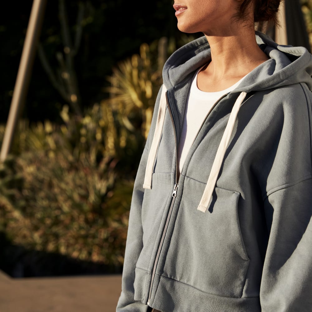 The Track Organic Cotton Hoodie in Faded Blue — front view