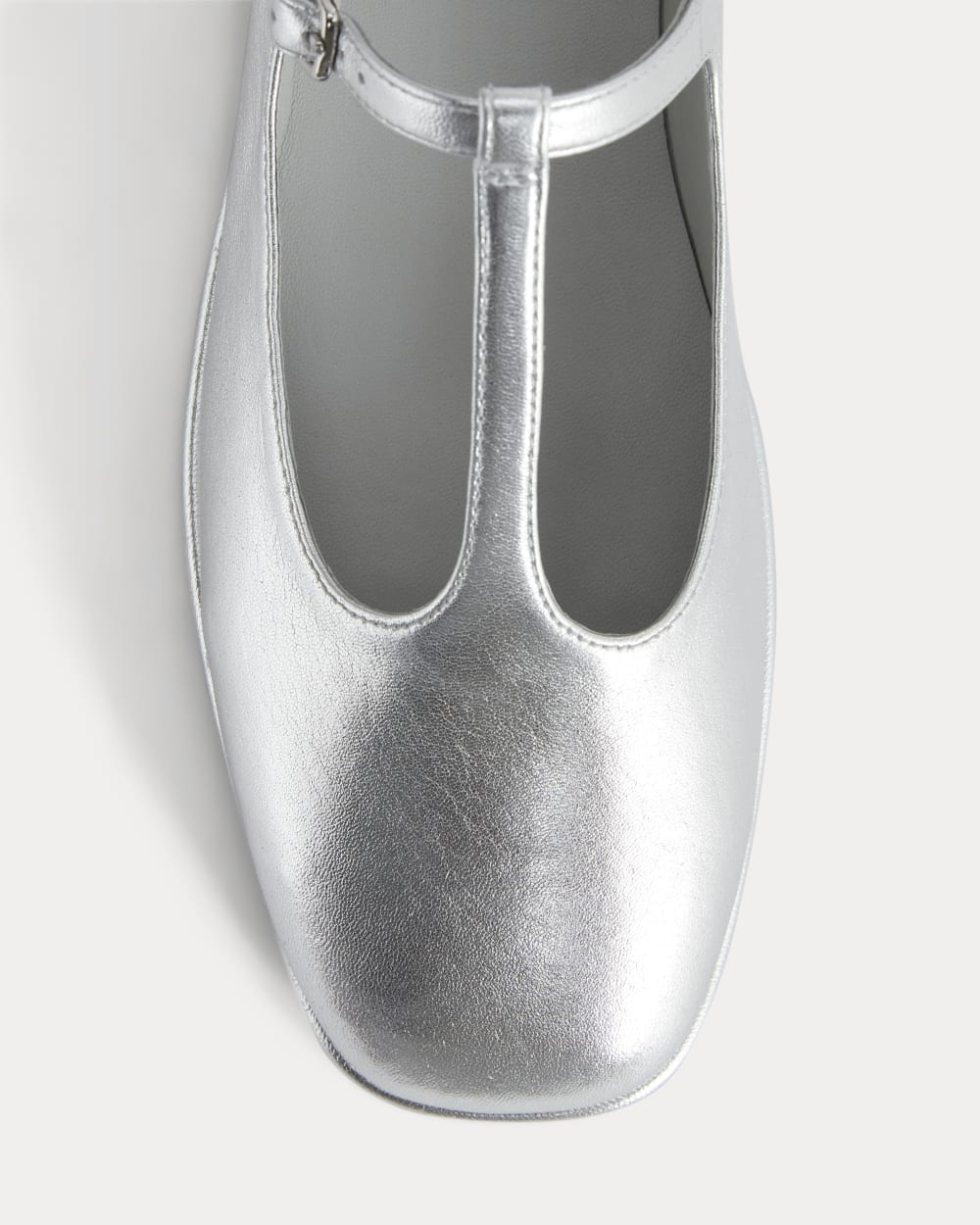 The Leather T-Strap Flat in Silver — detail view