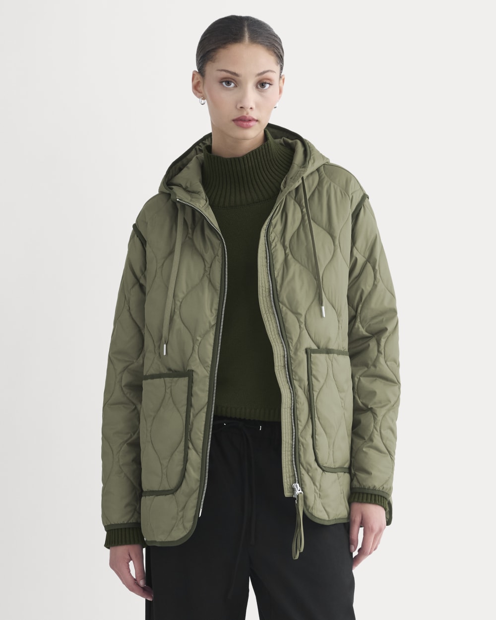 ReNew Quilted Hooded Liner in Lichen Green — front view