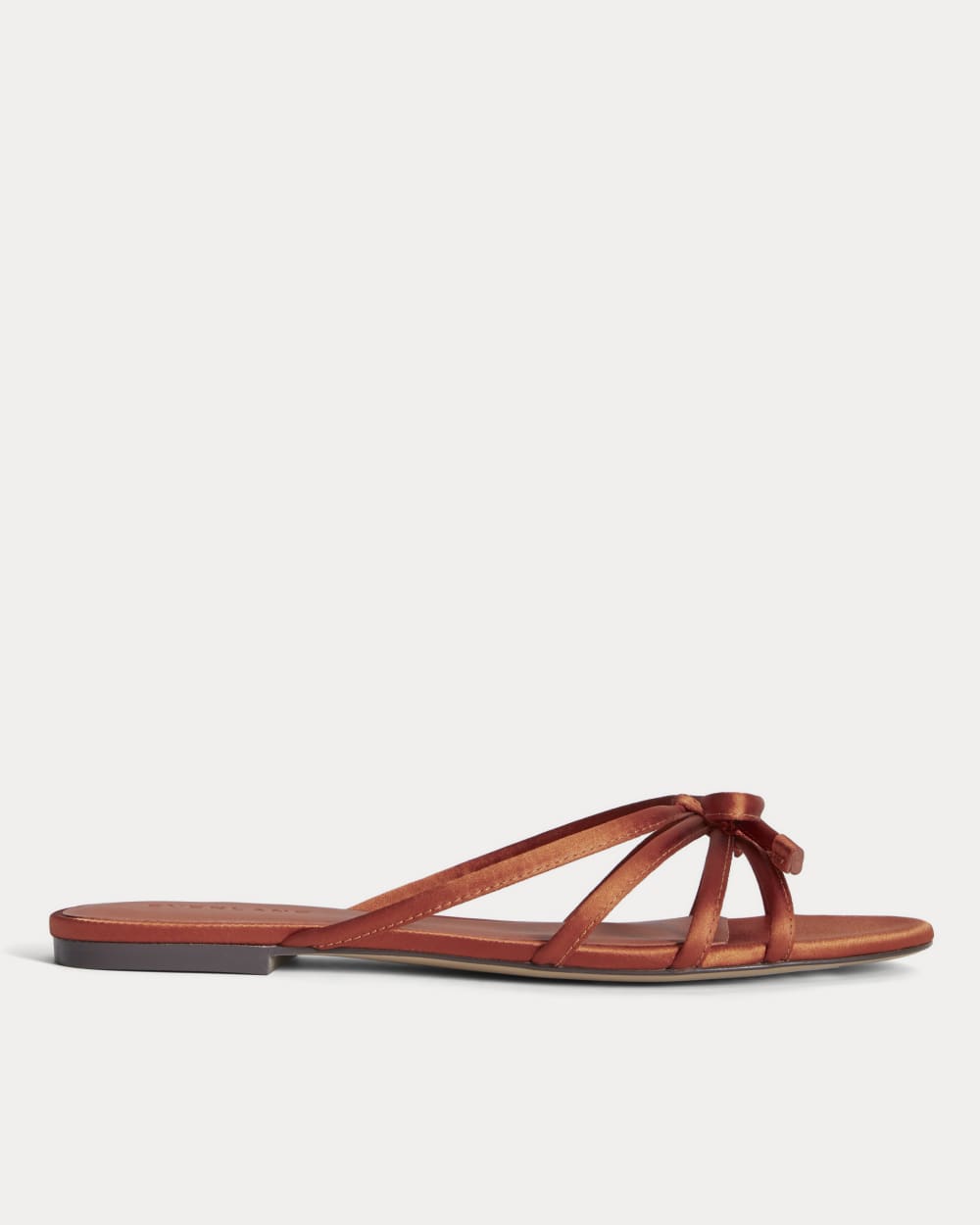 The Bow Sandal in Deep Amber Satin — front view