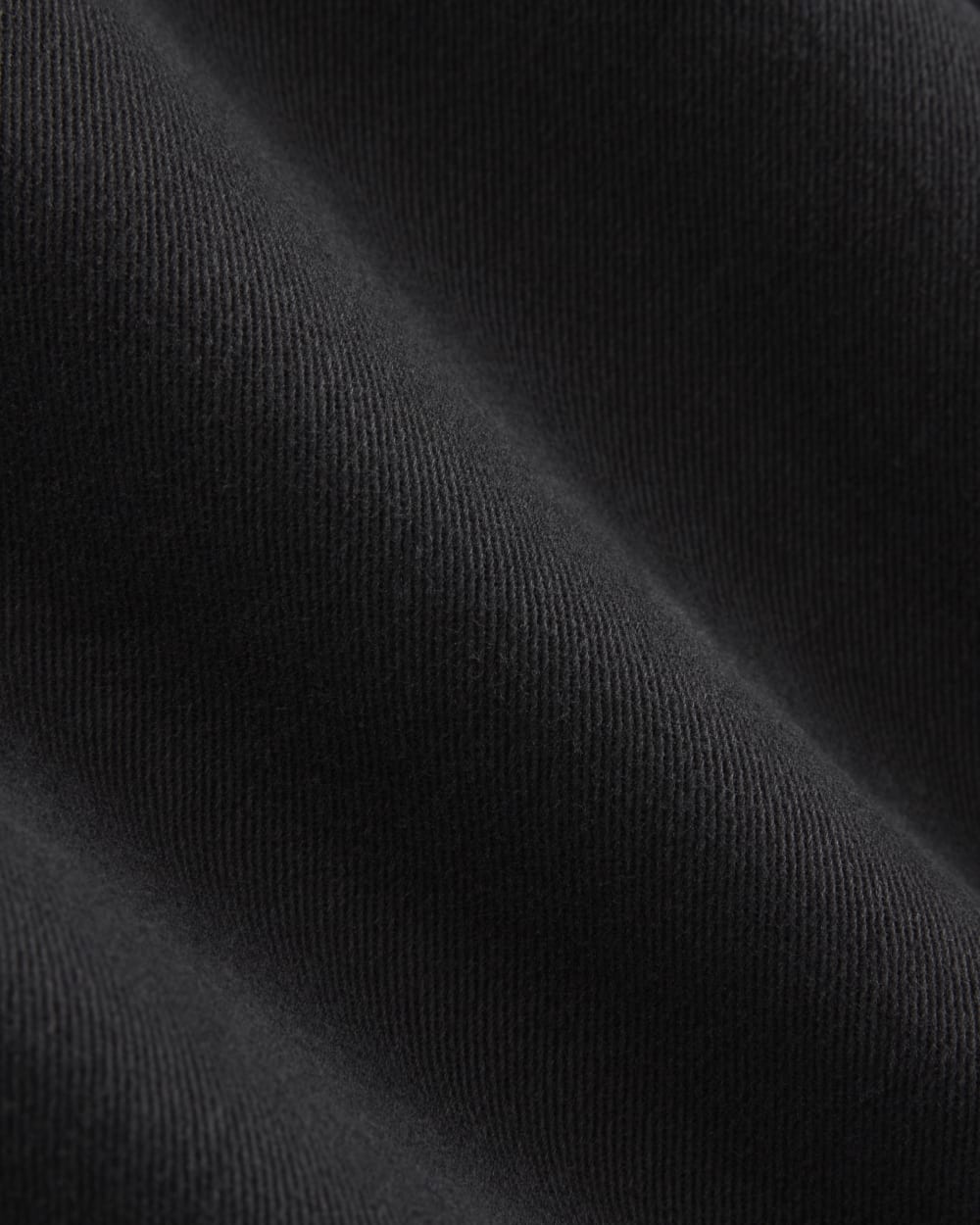 Twisted Seam Barrel Pant in Black — detail view