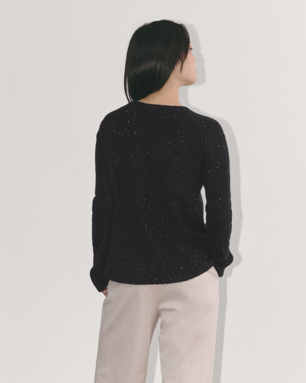 The V-Neck Sweater in Plush Cotton in Black Confetti — detail view