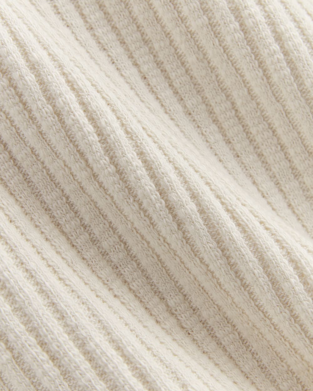 The Rib-Knit Short-Sleeve Henley in Bone — detail view