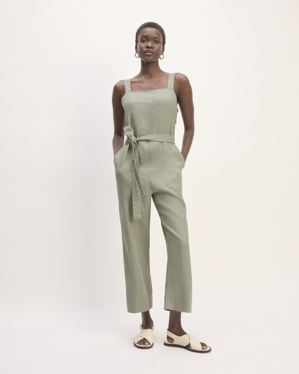 The Linen Side-Button Jumpsuit in Sage Green — front view
