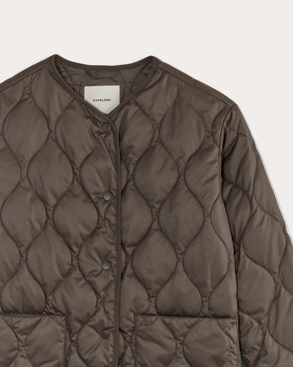 The Quilted Liner in Earth Brown — detail view