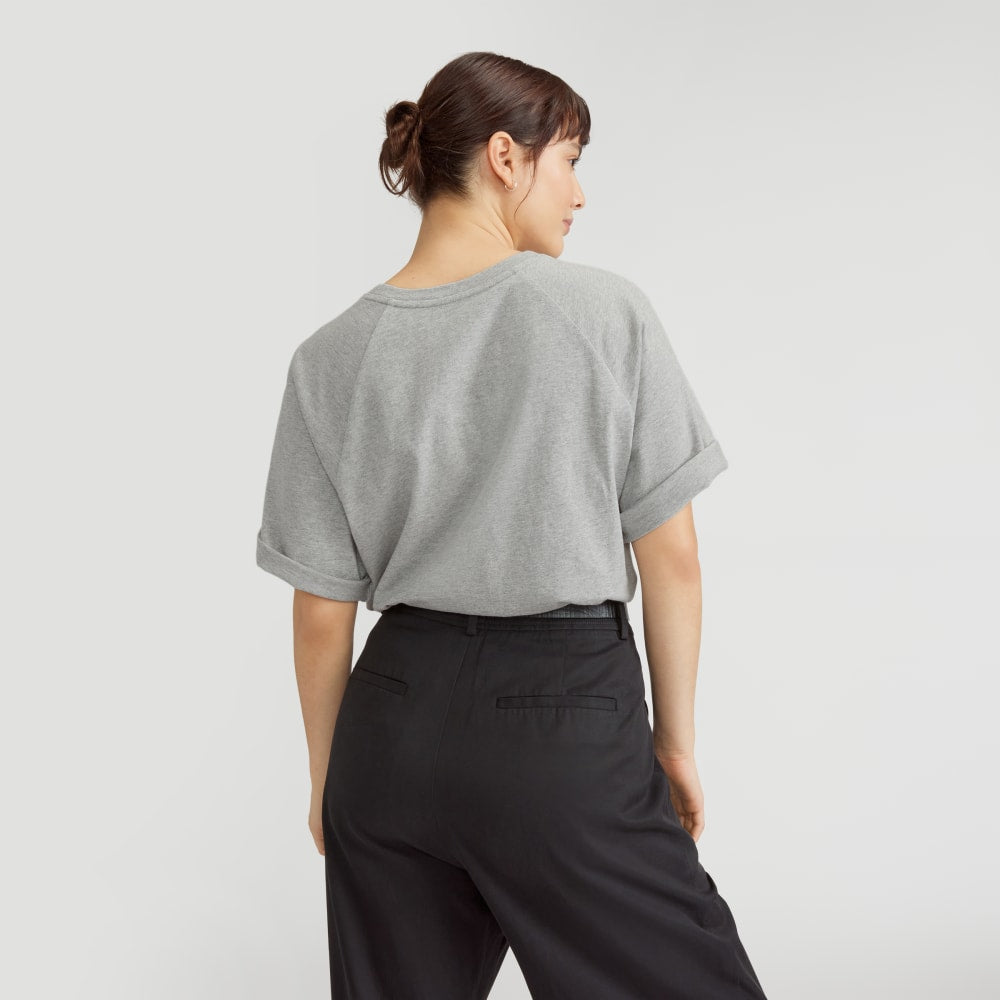 The Organic Cotton Raglan Tee in Heathered Grey — detail view