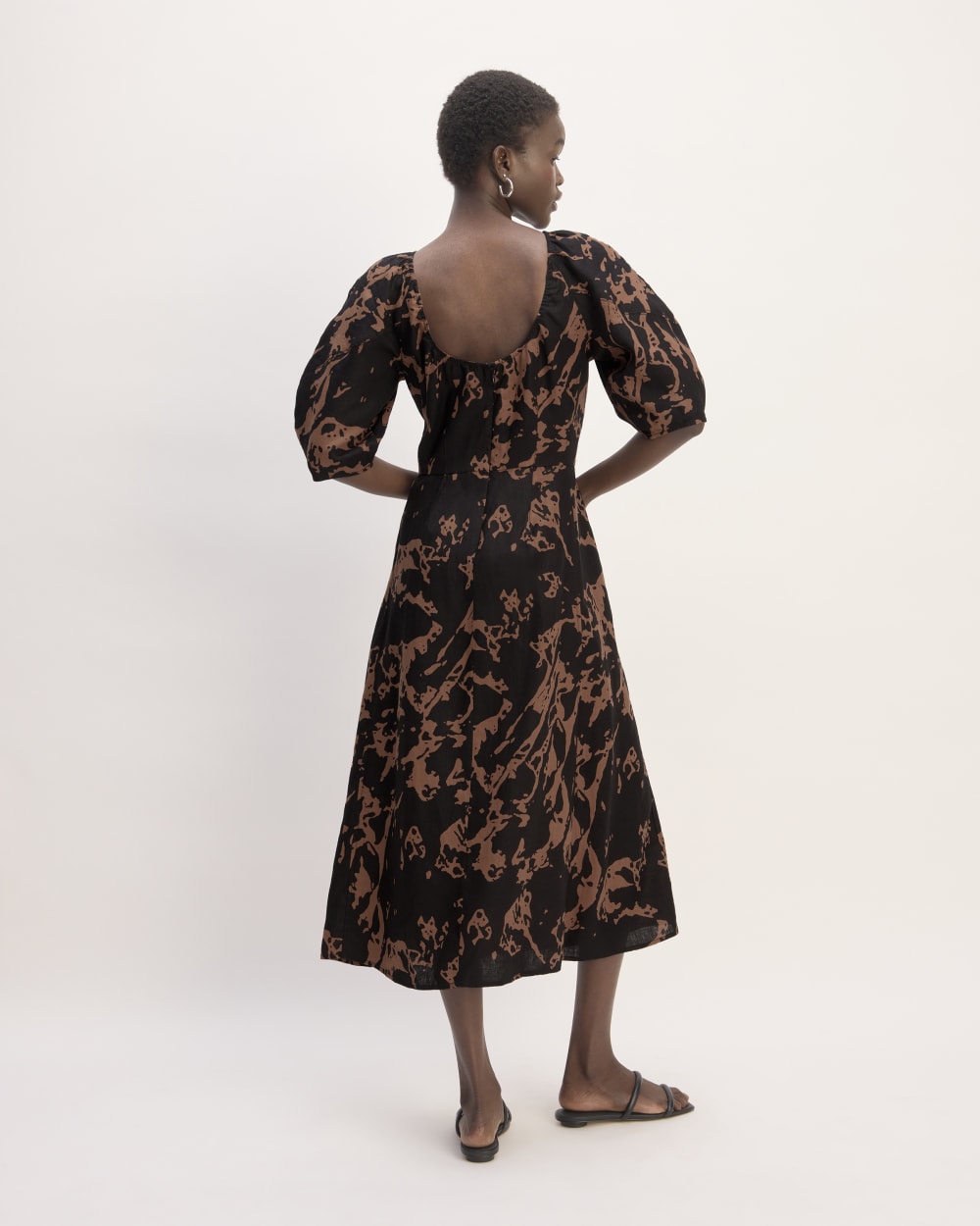The Linen Short-Sleeve Scoop Midi Dress in Carob Brown Abstract — detail view