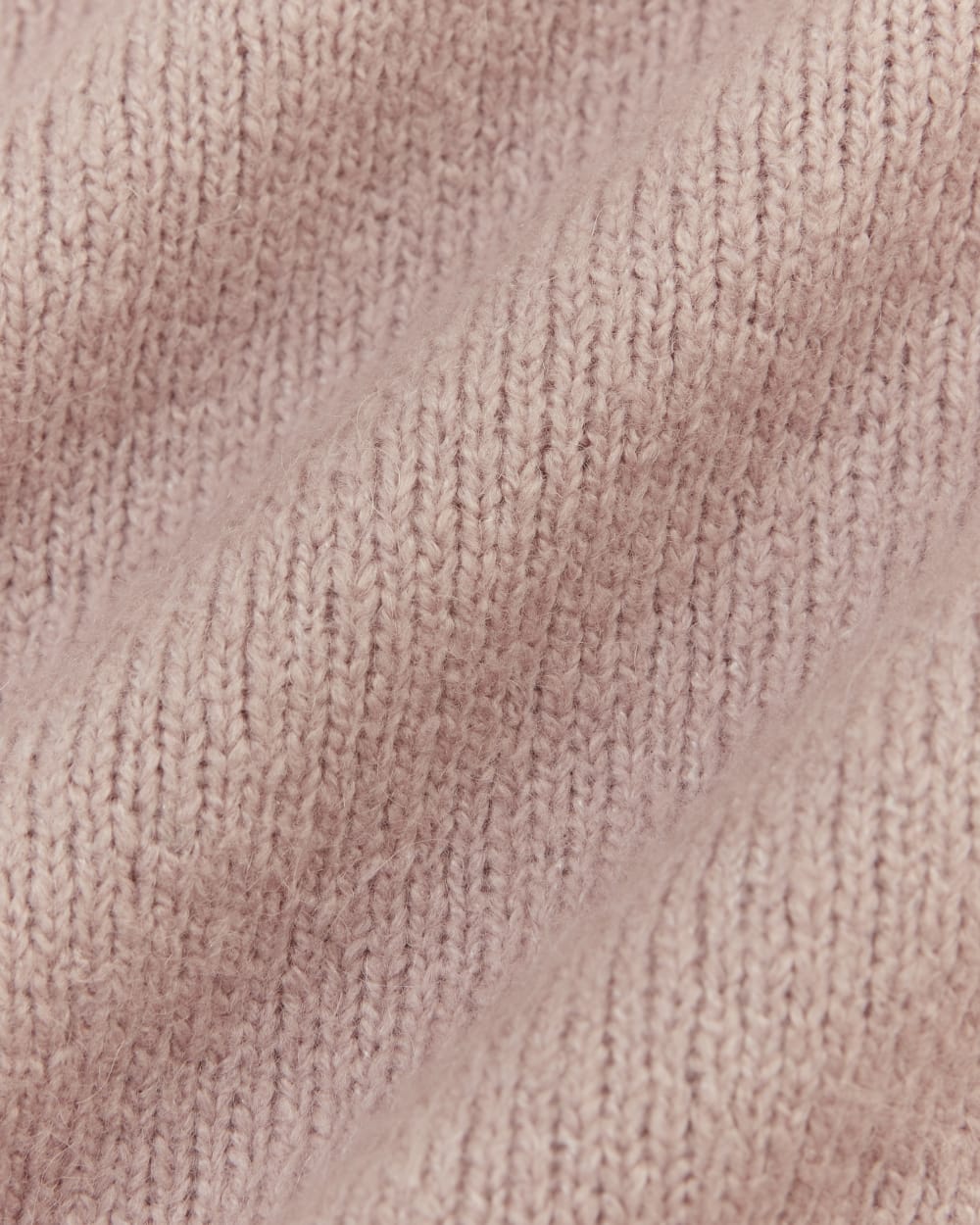 The V-Neck Sweater in Plush Cotton in Dusty Rose — detail view